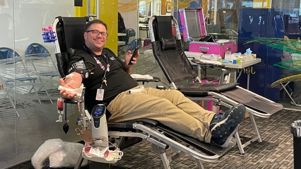 Elie Y. Katz, President and CEO of NRS, donates blood.